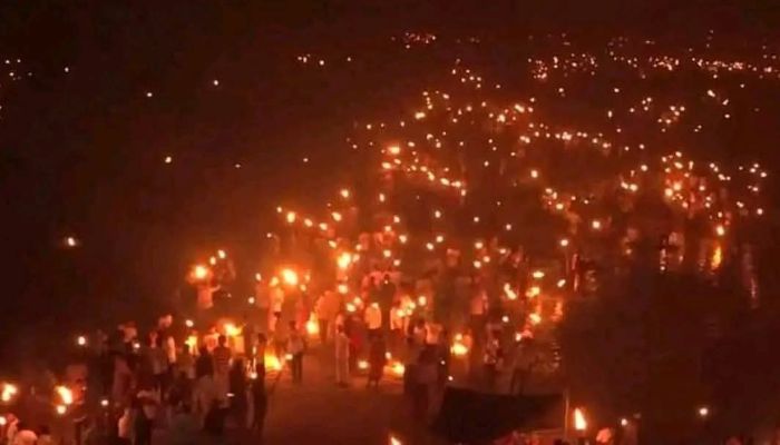 বুড়ি তিস্তা নদী খনন প্রকল্পের প্রতিবাদে মশাল মিছিল